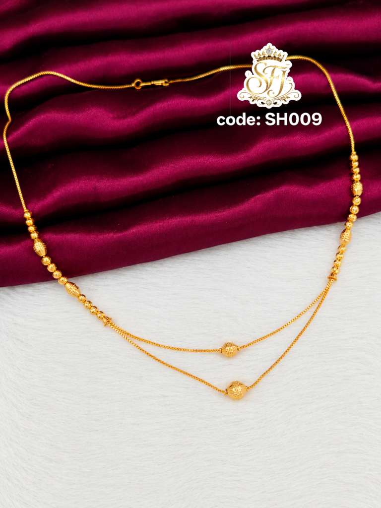 Layered gold beads necklace