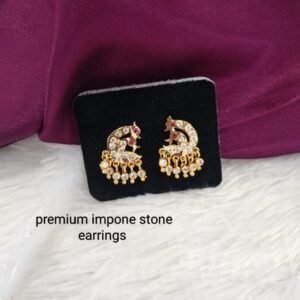 peacock model Impone earrings