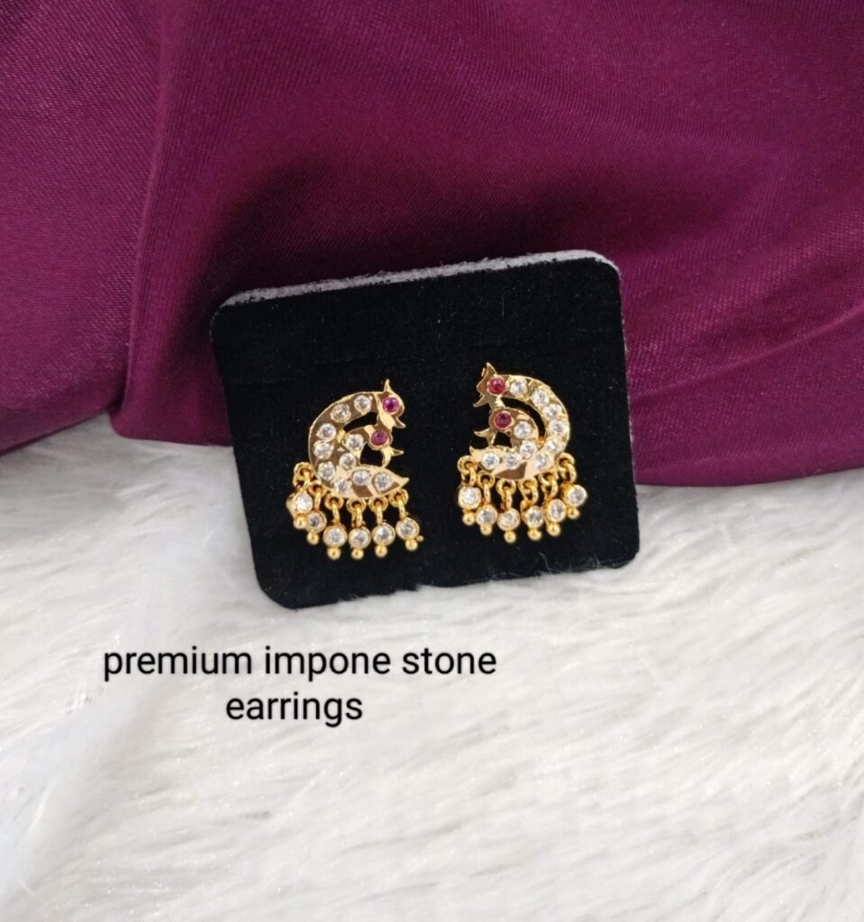 peacock model Impone earrings