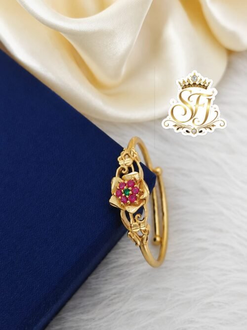 Gold covering adjustable floral finger ring with ruby and green stones for women featuring a premium gold finish by SFJ Gold Covering.