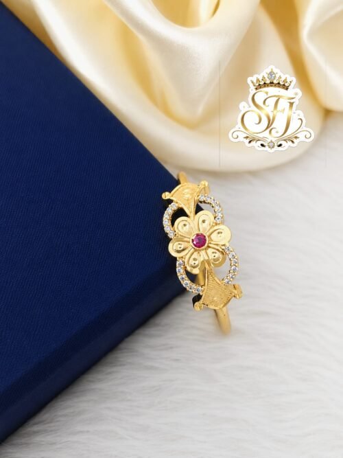 Gold covering adjustable floral finger ring with ruby center stone and sparkling CZ accents for women featuring a premium gold finish by SFJ Gold Covering.