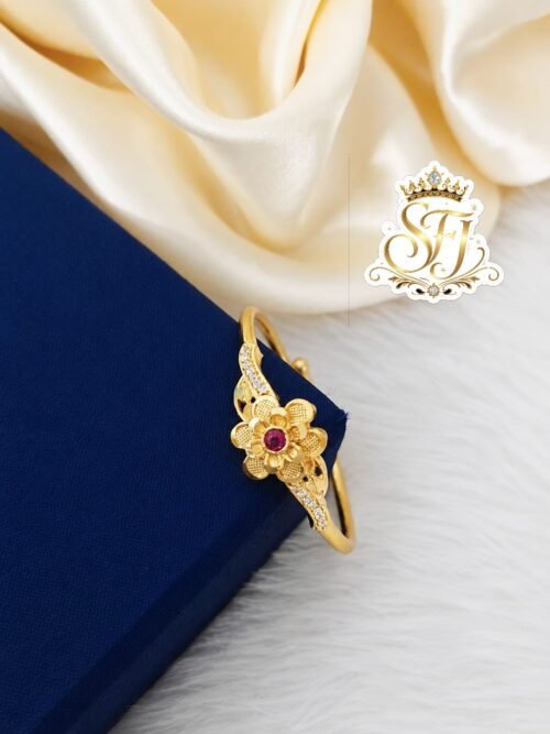 Gold covering adjustable floral finger ring with ruby center stone and sparkling CZ accents for women featuring a premium gold finish by SFJ Gold Covering.