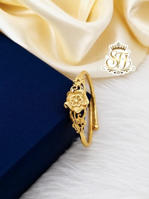 Gold covering antique floral adjustable finger ring for women with elegant flower design and premium gold finish imitation jewellery by SFJ Gold Covering.