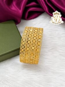 Premium gold finish designer bangles with geometric cutwork design, lightweight traditional imitation jewellery for bridal, festive and daily wear.
