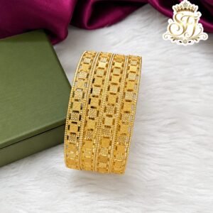 Premium gold finish designer bangles with geometric cutwork design, lightweight traditional imitation jewellery for bridal, festive and daily wear.