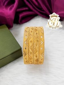 Premium gold finish geometric pattern designer bangles with intricate textured detailing, lightweight imitation jewellery for bridal, festive, and daily wear.