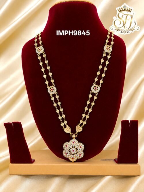 Impone floral pendant long haram with double heart chain design, gold finish traditional covering jewellery for women.