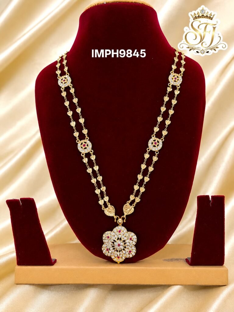 Impone floral pendant long haram with double heart chain design, gold finish traditional covering jewellery for women.