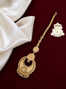 Designer floral gold covering bridal maang tikka for women.