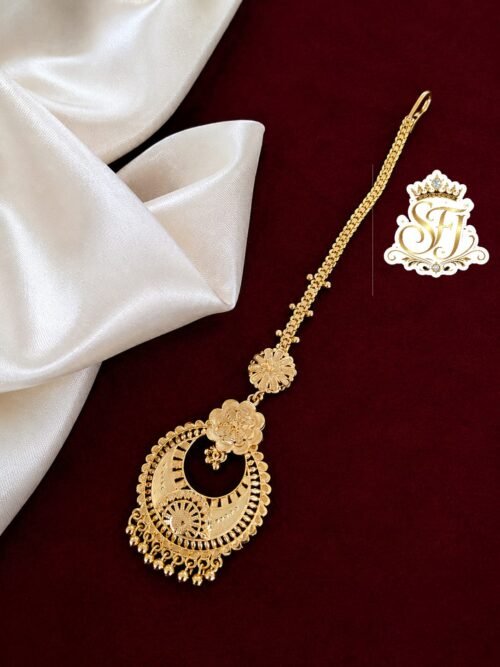 Designer floral gold covering bridal maang tikka for women.