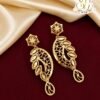 Designer leaf pattern gold covering dangler earrings.