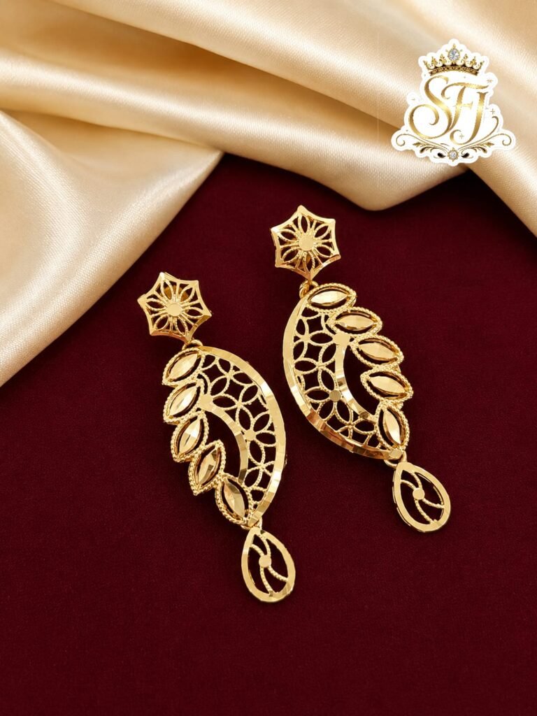 Designer leaf pattern gold covering dangler earrings.