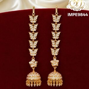 Gold finish butterfly design long jhumka earrings with sparkling AD stones and traditional hanging beads for bridal and festive wear.