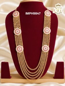Premium floral multi-layer long haram with AD stone motifs and gold finish bridal necklace.