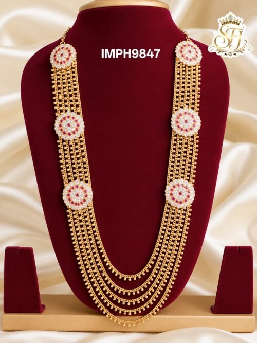 Premium floral multi-layer long haram with AD stone motifs and gold finish bridal necklace.