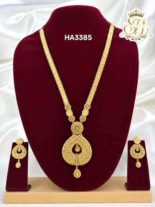 One gram gold plated traditional haram set with matching earrings and designer pendant.