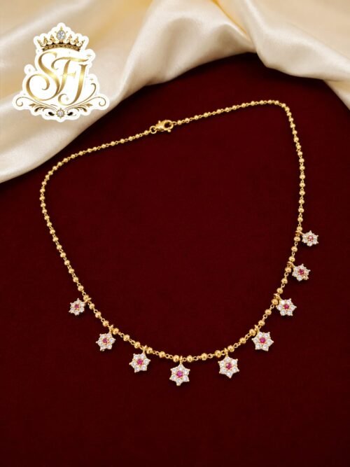 Gold covering white floral stone necklace with elegant charm design
