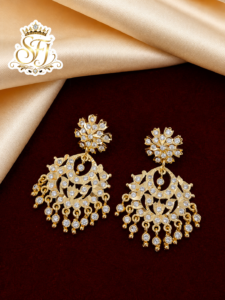 Impone white stone earrings