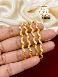Gold Covering Wavy Design Bangles