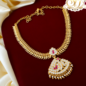 Traditional mullai mottu attigai with ruby white pendent