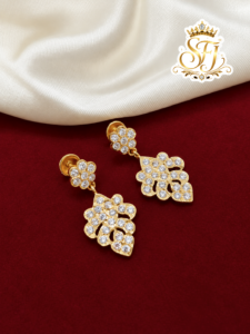 White stone wing design earring